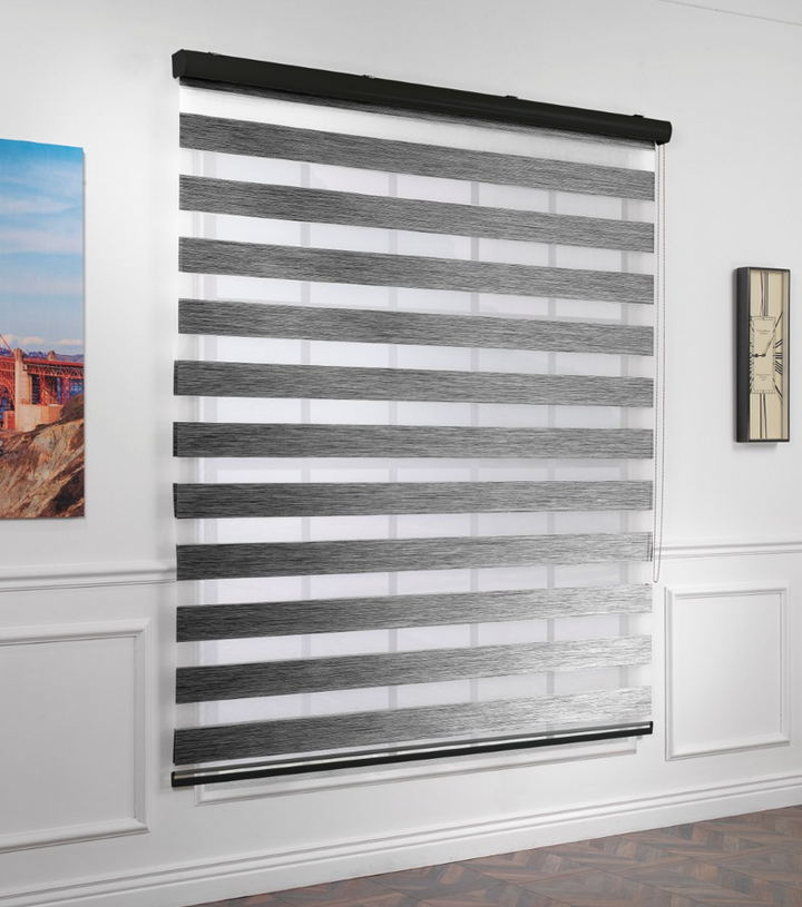 Made to measure striped roller blind in grey, designed with alternating sheer and opaque horizontal stripes for adjustable light control and privacy, highlighting the bold black tone, smooth texture and modern day‑and‑night blind style.