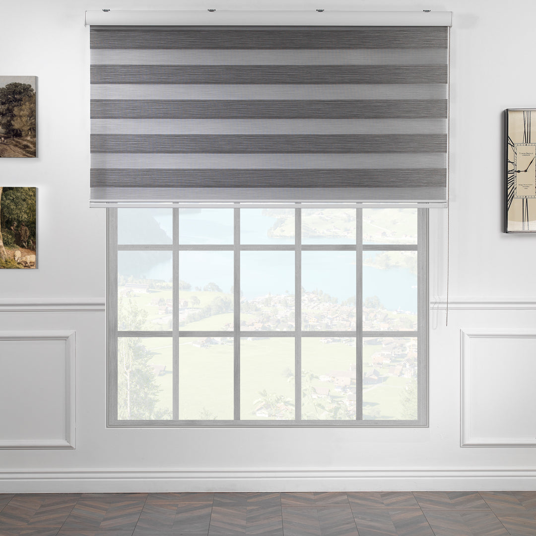Made to measure zebra roller blind in grey, designed with alternating sheer and opaque horizontal stripes for adjustable light control and privacy, highlighting the bold black tone, smooth texture and modern day‑and‑night blind style.
