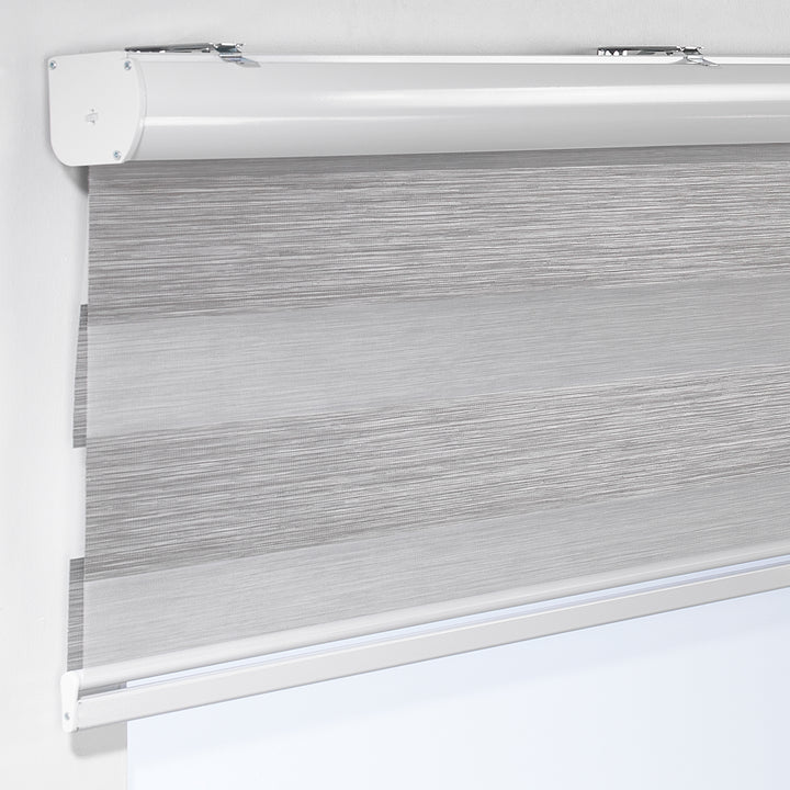 Made to measure striped roller blind in silver grey , designed with alternating sheer and opaque horizontal stripes for adjustable light control and privacy, highlighting the bold black tone, smooth texture and modern day‑and‑night blind style.