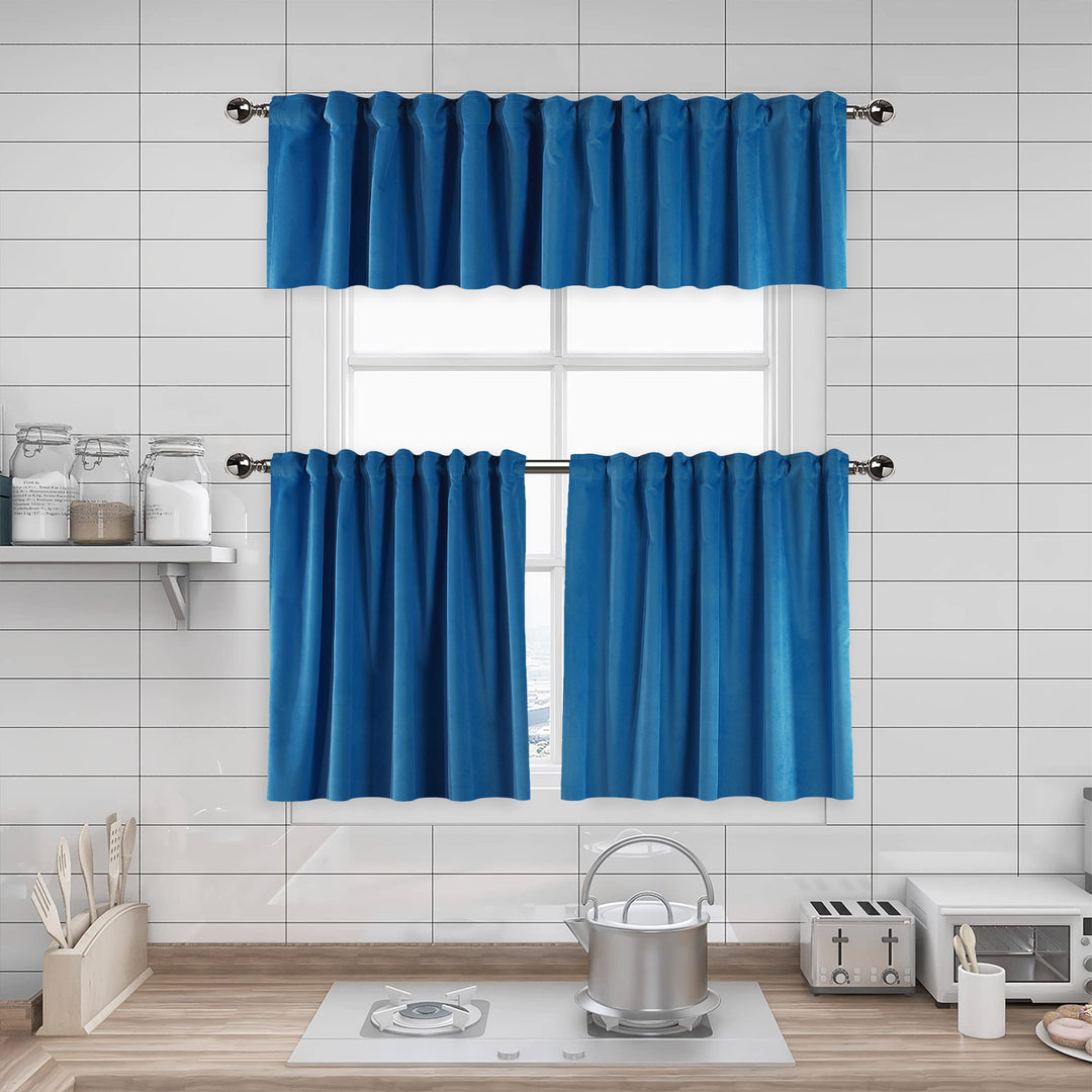 A made to measure kitchen valance in bright ocean‑blue matte velvet, featuring a velvety surface and neatly tailored seams for a vibrant premium appearance