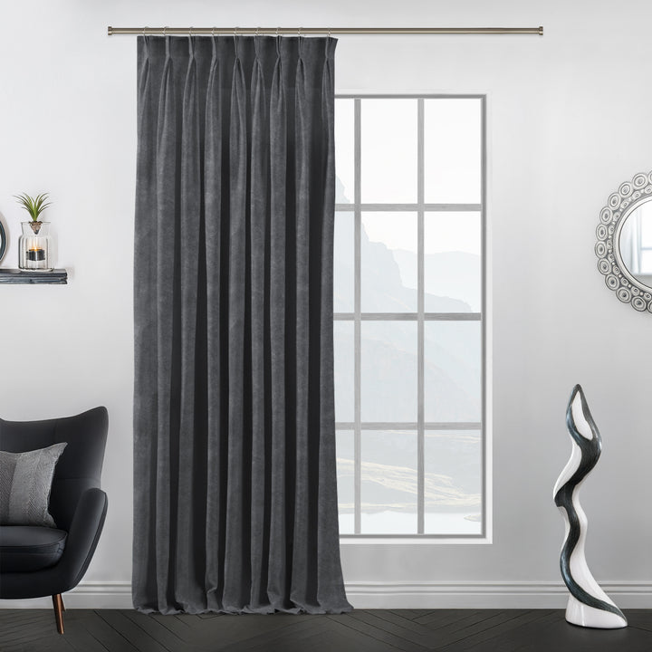 Hand‑finished pinch pleat header on iron matte velvet curtain, structured shape and premium drape.”