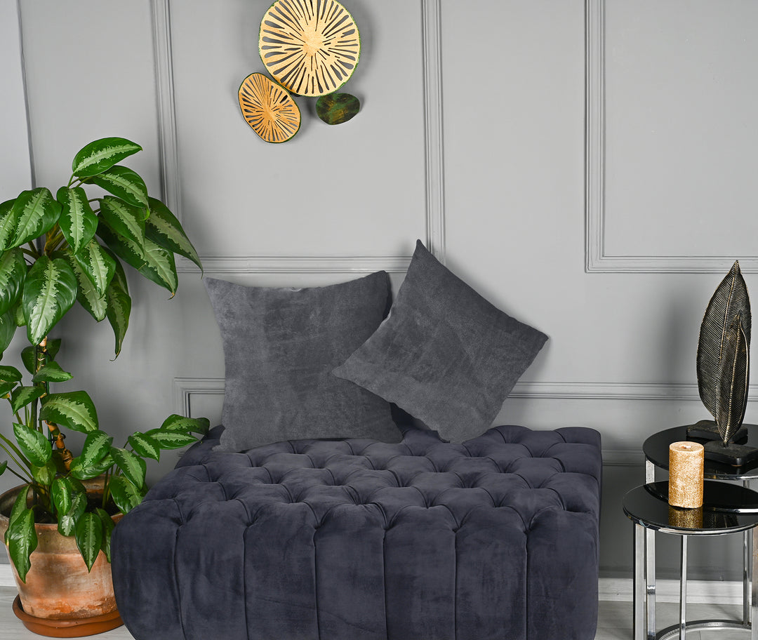 A made to measure cushion cover in cool iron‑grey matte velvet, shown with a smooth plush texture and clean structured edges for a sleek modern appearance