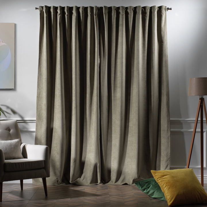 Full‑length matte velvet curtain with natural folds and a premium tailored finish.”