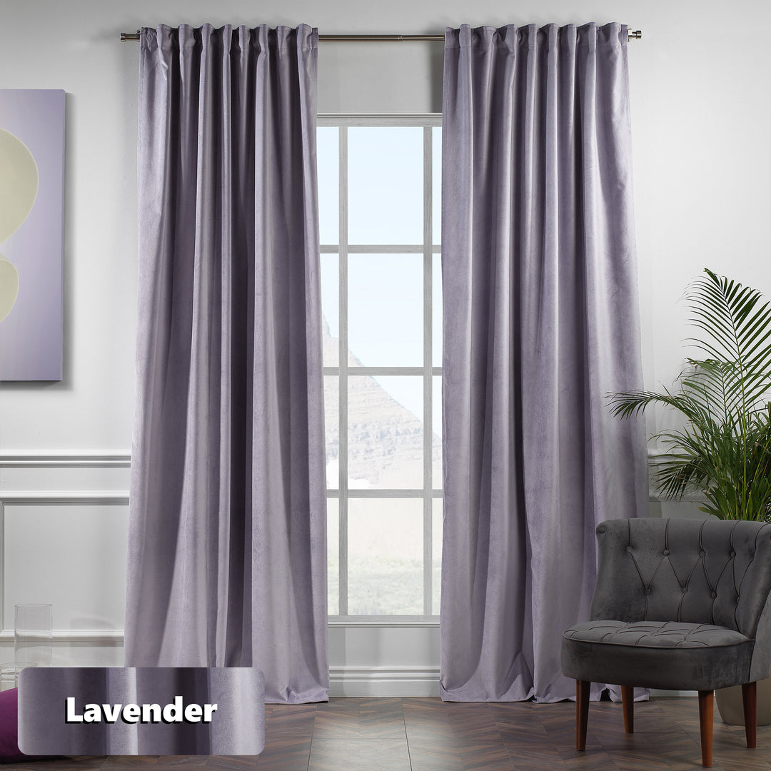 Made‑to‑measure lavender matte velvet curtain draping to the floor, wide coverage and clean tailored look.
