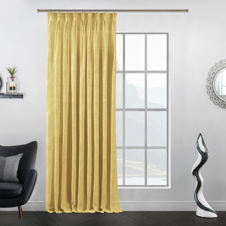 Pastel yellow pinch pleat velvet curtain, extra‑wide fullness and elegant folds.