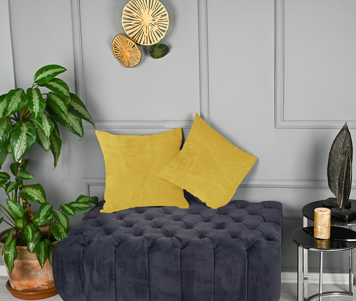 A made to measure cushion cover in soft lemon‑yellow matte velvet, shown with a smooth plush texture and neatly tailored edges for a light cheerful finish