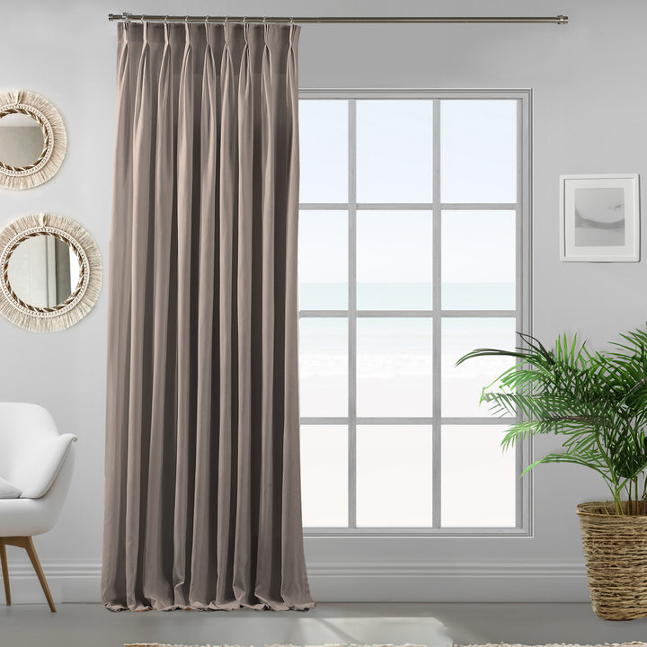 Single light stone velour curtain panel showing soft drape, smooth pile and refined tailored fall.