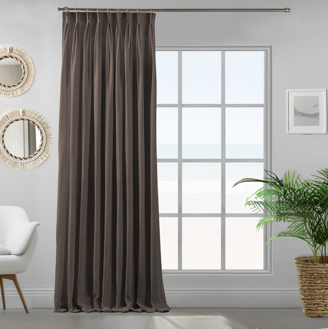 Single pinch pleated light brown velour curtain panel showing soft drape and premium matte finish.