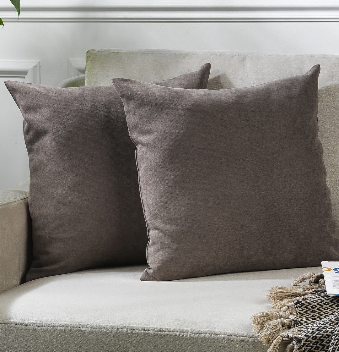 A made to measure cushion cover in soft light‑brown velour, featuring a smooth lightweight surface and refined seams for a natural elegant appearance