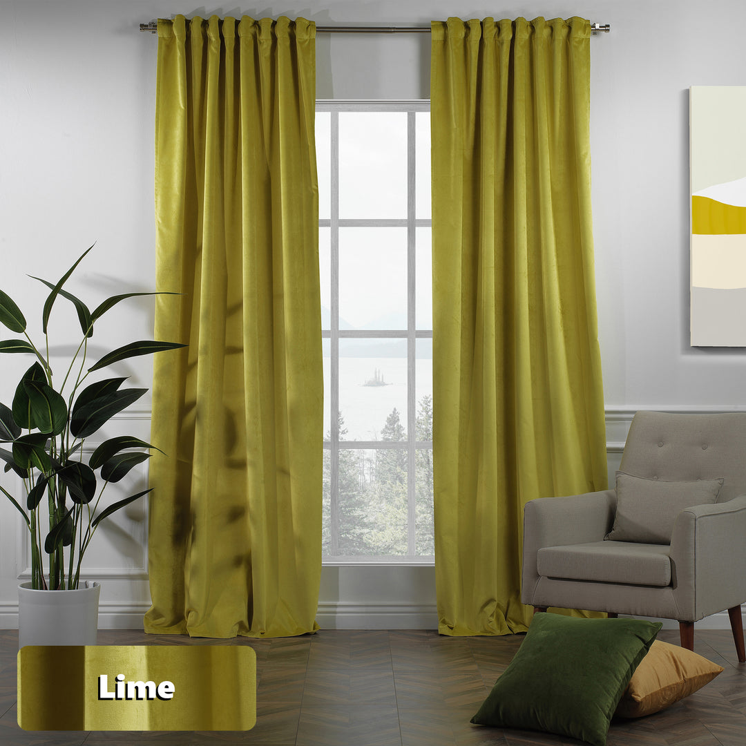 Fresh green velvet eyelet curtain panel with long fluid fall.