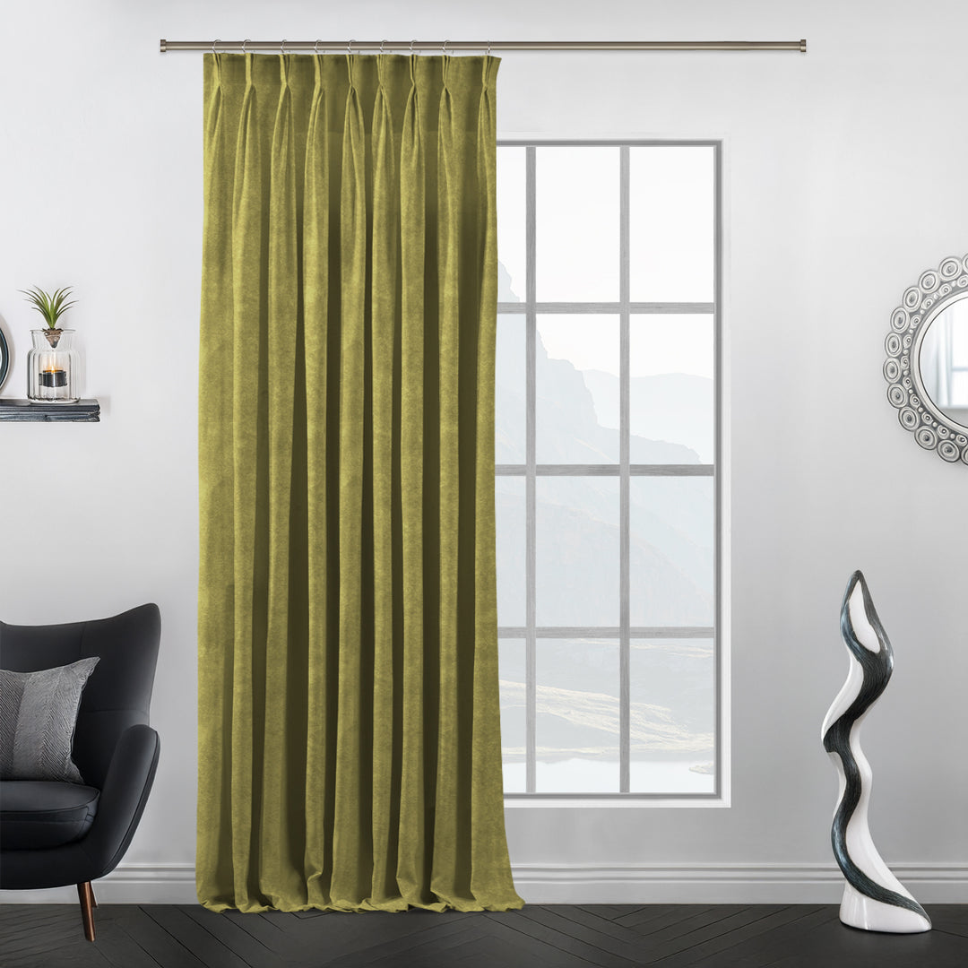 Lime matte velvet pinch pleat curtain with crisp pleats and bold fresh‑green colour.”