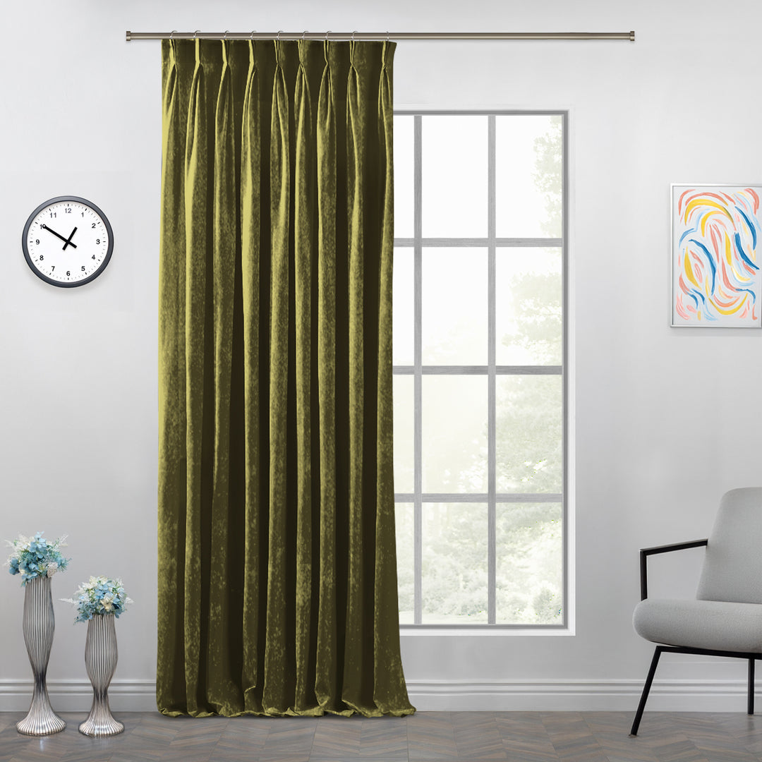 Shiny velvet pinch pleat curtain with reflective sheen and crisp handcrafted pleats in a long tailored drop