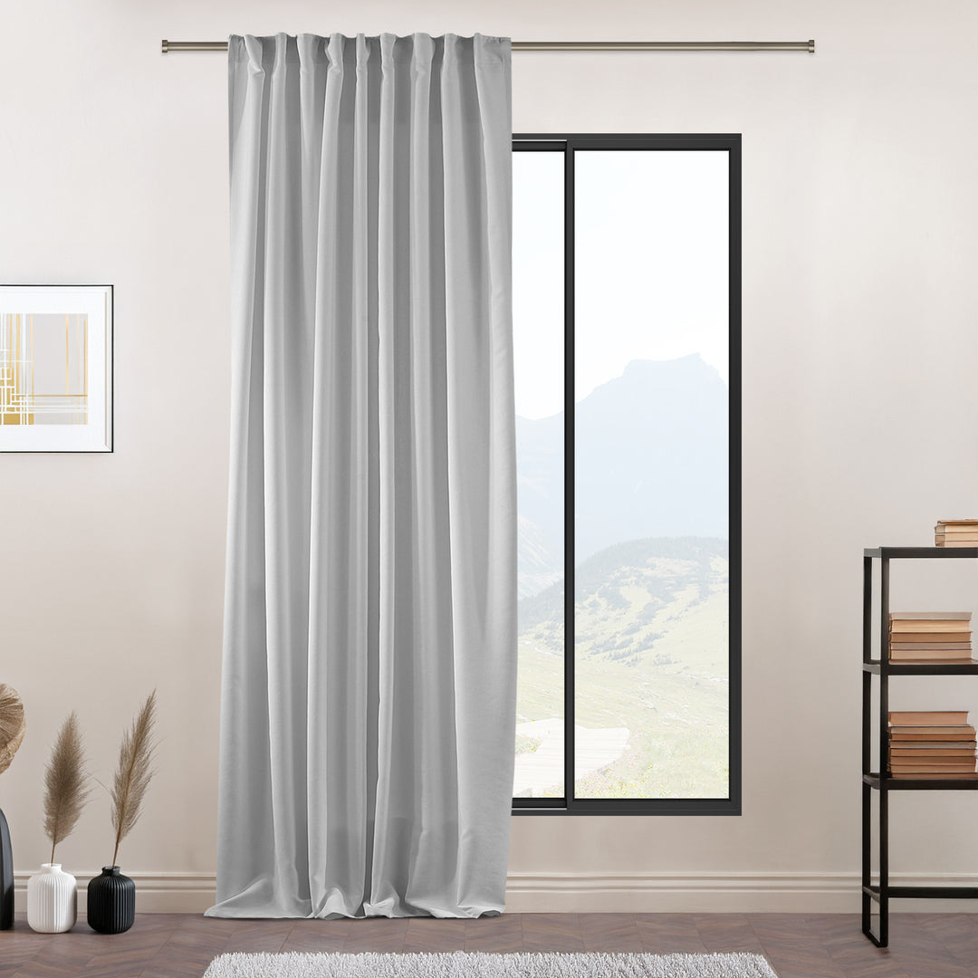 Made to measure white matte velvet curtain featuring a soft smooth drape and muted velvety texture, offering gentle light reduction and a clean elegant look, highlighting its pure white tone and premium modern velvet finish