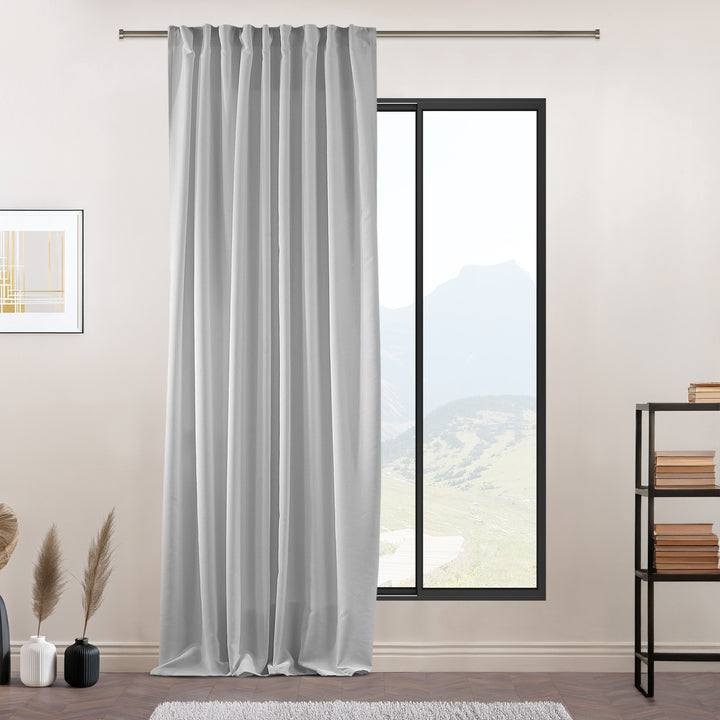 Made to measure white matte velvet curtain featuring a soft smooth drape and muted velvety texture, offering gentle light reduction and a clean elegant look, highlighting its pure white tone and premium modern velvet finish
