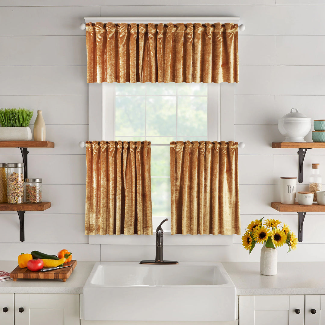  A made to measure valance in warm marigold‑yellow shiny velvet, featuring a soft glossy sheen and neatly structured seams for a lively premium look