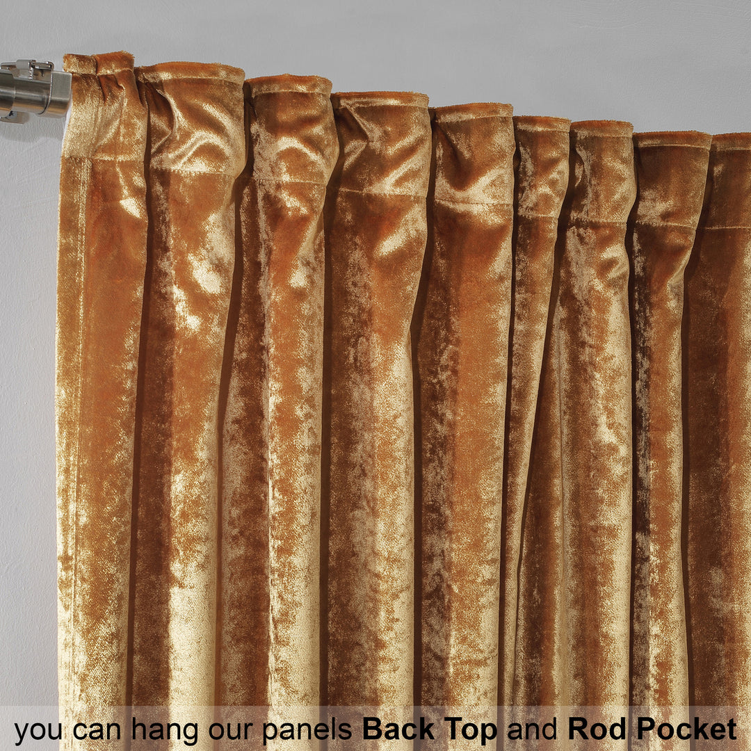 Close‑up of shiny velvet fabric showing reflective sheen, smooth surface and soft flowing texture.