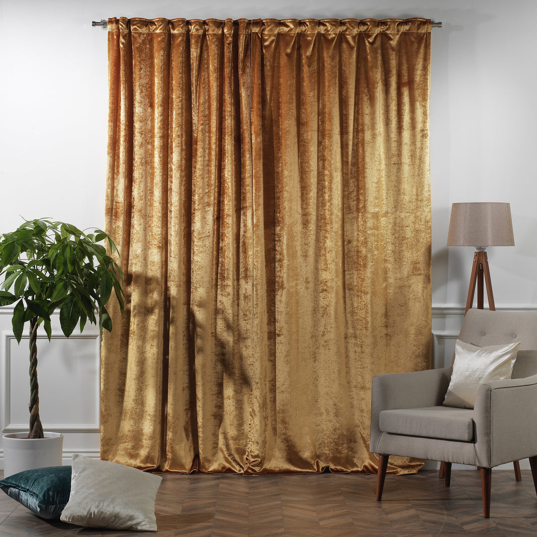Luxury shiny velvet curtain with smooth glossy texture and a long, graceful drop.
