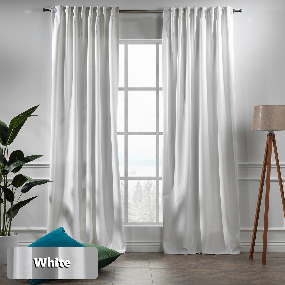 Made to measure white matte velvet curtain featuring a soft smooth drape and muted velvety texture, offering gentle light reduction and a clean elegant look, highlighting its pure white tone and premium modern velvet finish