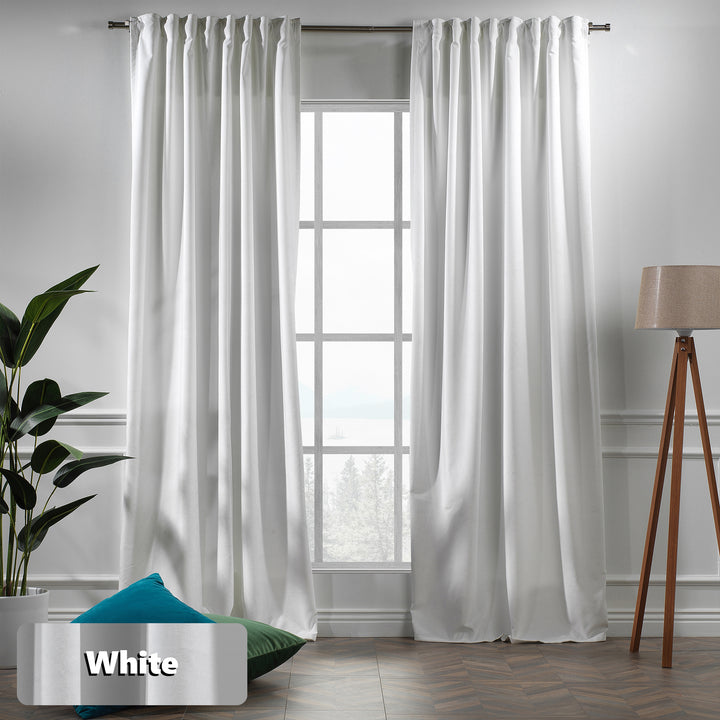 Made to measure white matte velvet curtain featuring a soft smooth drape and muted velvety texture, offering gentle light reduction and a clean elegant look, highlighting its pure white tone and premium modern velvet finish