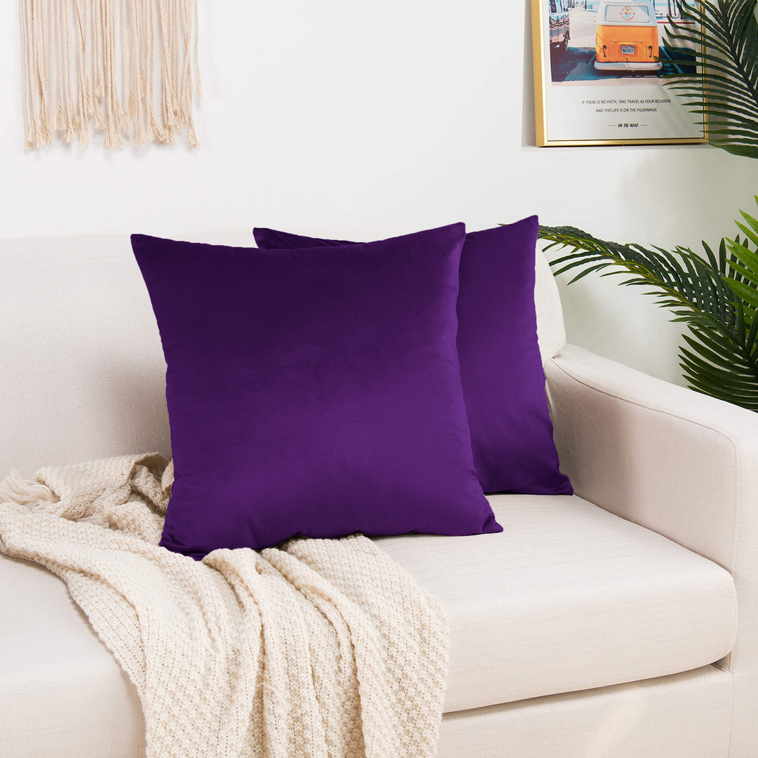  A made to measure cushion cover in soft mauve‑pink shiny velvet, shown with a gentle reflective sheen and clean edges for a delicate elegant finish
