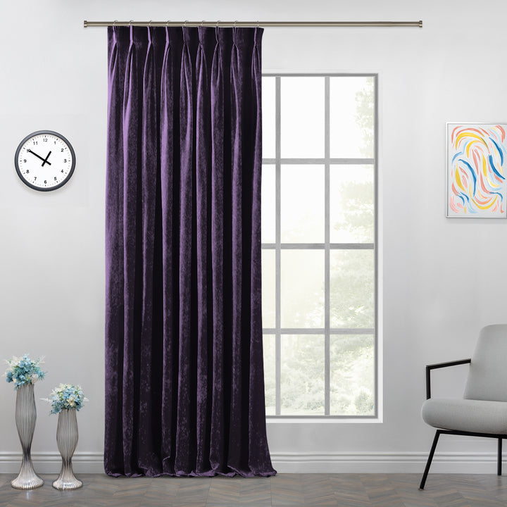 Shiny velvet pinch pleat curtain with polished texture and deep, structured handcrafted pleats