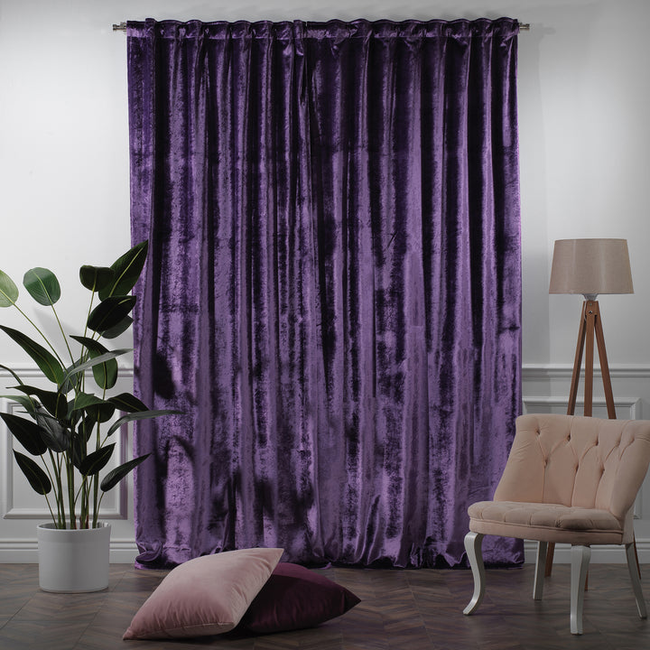 Shiny velvet curtain with a smooth, light‑catching texture and wide tailored proportions.