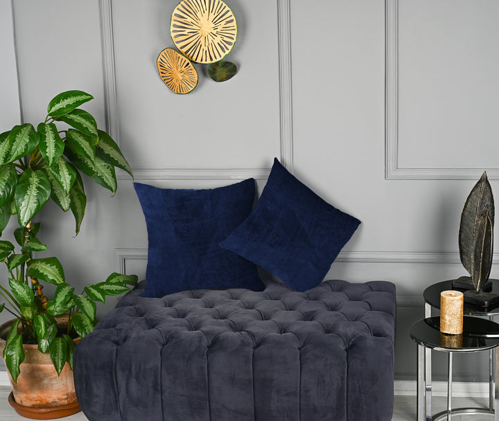 A made to measure cushion cover in deep midnight‑blue matte velvet, shown with a smooth plush texture and refined seams for a rich elegant finish