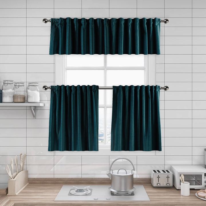 A made to measure kitchen valance in dark forest‑green matte velvet, featuring a velvety surface and crisp seams for a bold premium finish