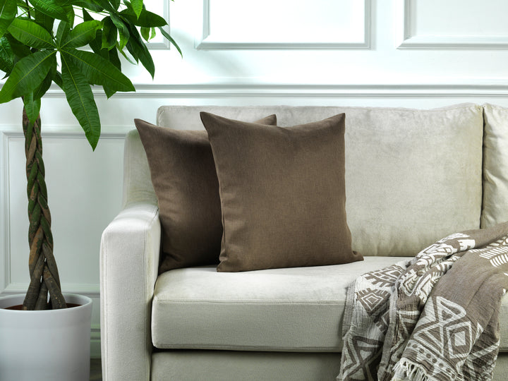 A made to measure cushion cover in soft mink‑taupe linen‑look fabric, shown with a natural textured weave and neatly tailored edges for a calm elegant finish