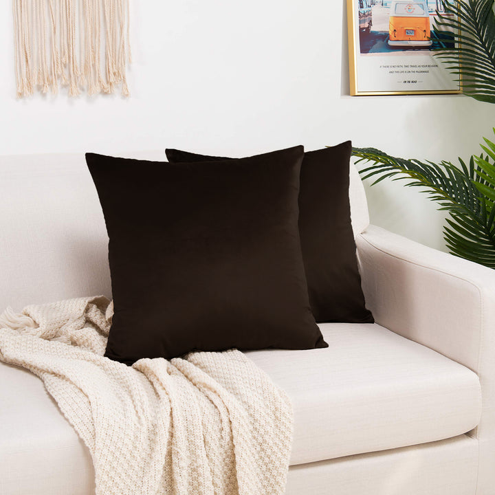  A made to measure cushion cover in warm mocha‑brown shiny velvet, shown with a reflective plush surface and clean refined edges for a rich elegant look