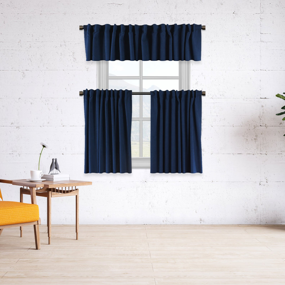 A made to measure kitchen valance in deep navy velour, shown with a soft lightweight texture and neatly finished seams for a rich premium look