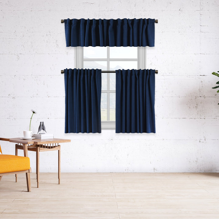A made to measure kitchen valance in deep navy velour, shown with a soft lightweight texture and neatly finished seams for a rich premium look