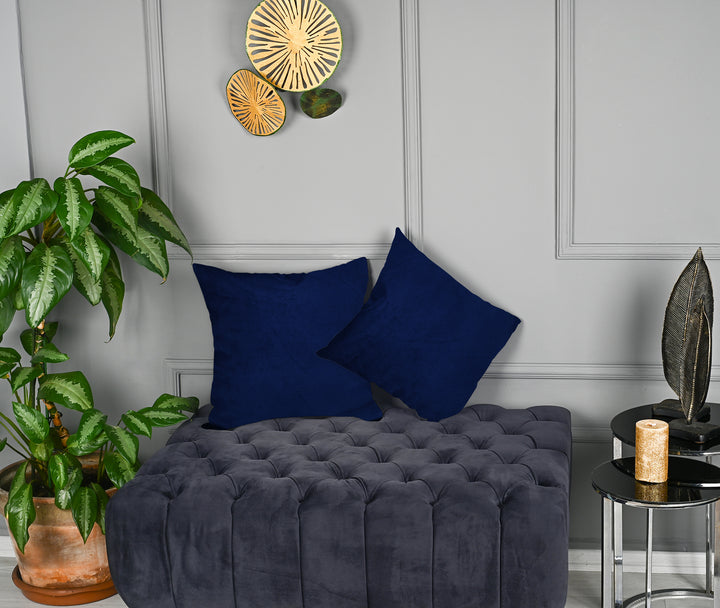 A made to measure cushion cover in classic navy matte velvet, featuring a soft velvety surface and clean tailored edges for a timeless premium look