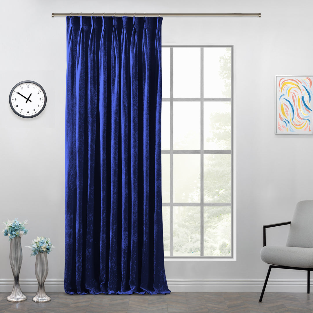 Custom shiny velvet pinch pleat curtain featuring reflective pleats and a smooth, luminous drape.