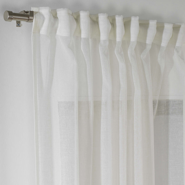 Detailed view of off‑white linen sheer texture with natural fibres and sheer finish.