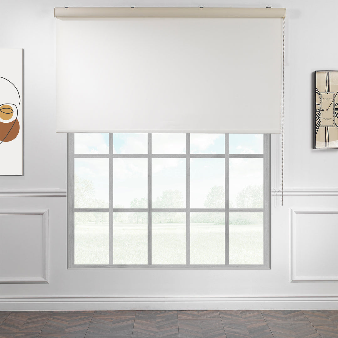 A made to measure off‑white room darkening roller blind shown with a soft matte surface and clean straight edges reducing incoming light