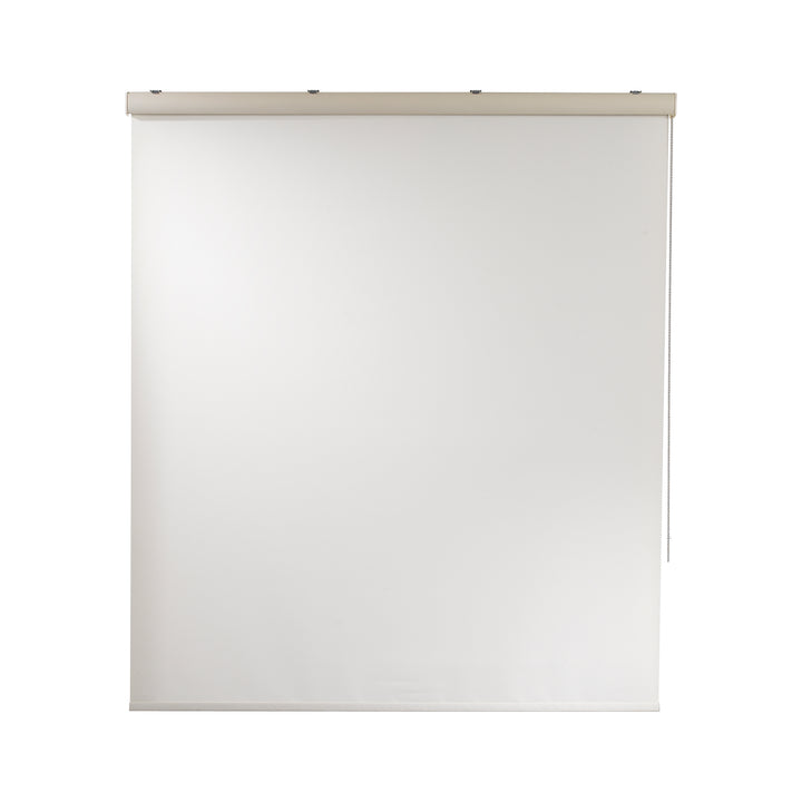 An off‑white room darkening roller blind made to measure, shown lowered with a smooth matte surface and clean minimal edges softening incoming light