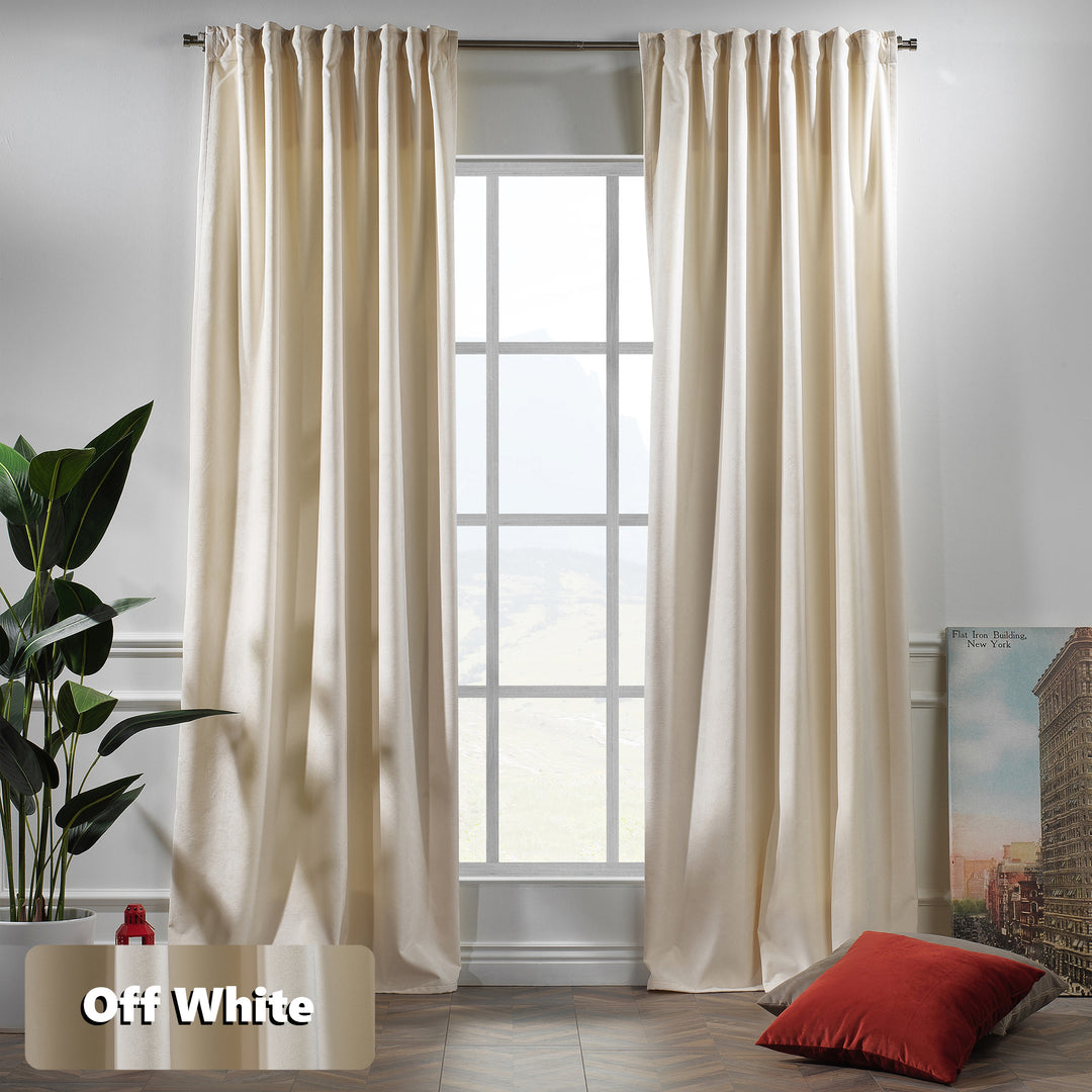 Off‑white matte velvet curtain featuring a soft smooth drape and muted velvety texture, offering gentle light reduction and a clean elegant look, highlighting its subtle off‑white tone and premium modern velvet finish.