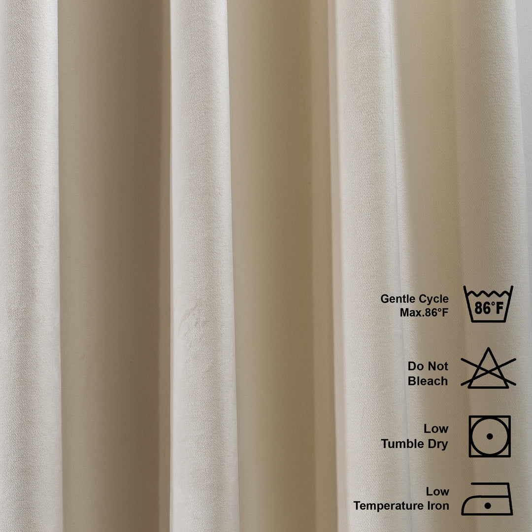 Off‑white matte velvet curtain featuring a soft smooth drape and muted velvety texture, offering gentle light reduction and a clean elegant look, highlighting its subtle off‑white tone and premium modern velvet finish.