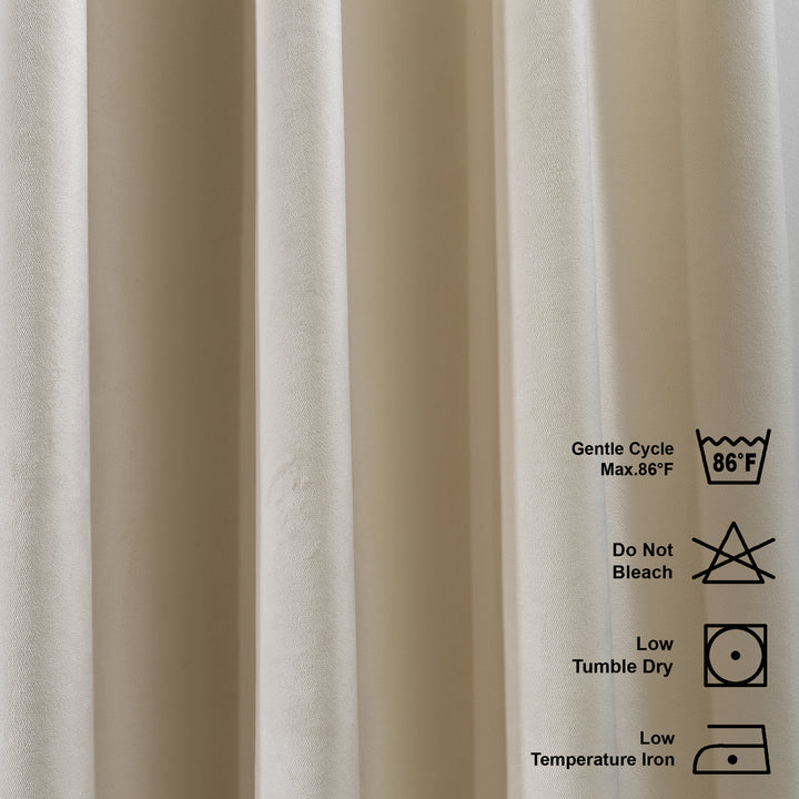 Off‑white matte velvet curtain featuring a soft smooth drape and muted velvety texture, offering gentle light reduction and a clean elegant look, highlighting its subtle off‑white tone and premium modern velvet finish.