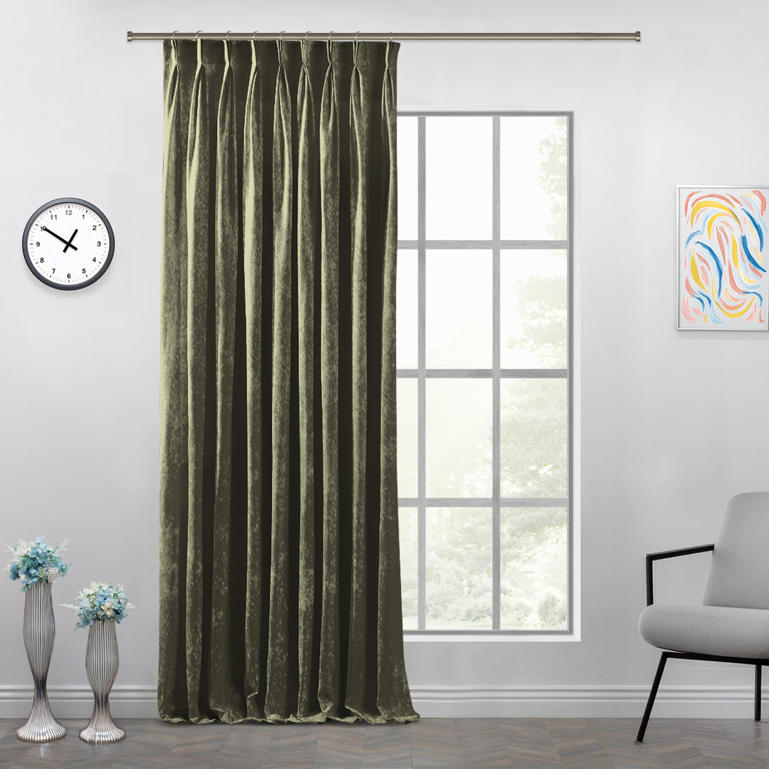Matte velvet curtain with precise pinch pleats and a long, graceful silhouette.