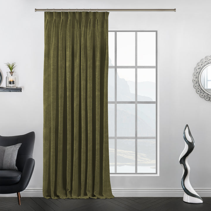 Pinch pleat matte velvet curtain designed with uniform pleats and extended length.