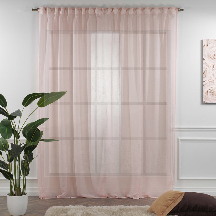 Pink linen sheer curtain fully closed in a bright living room, soft vertical folds and natural semi‑sheer texture.
