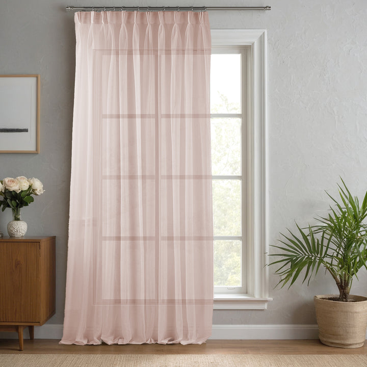 Pink made‑to‑measure linen‑sheer curtain with deep pinch pleats, soft natural texture and gentle light diffusion.