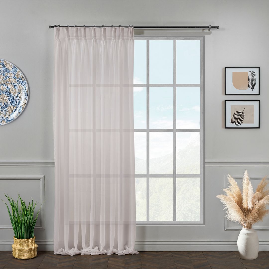 Made‑to‑measure extra‑long and extra‑wide pink pinch‑pleated chiffon semi‑sheer curtain with refined structured pleats and a soft pastel translucent drape.