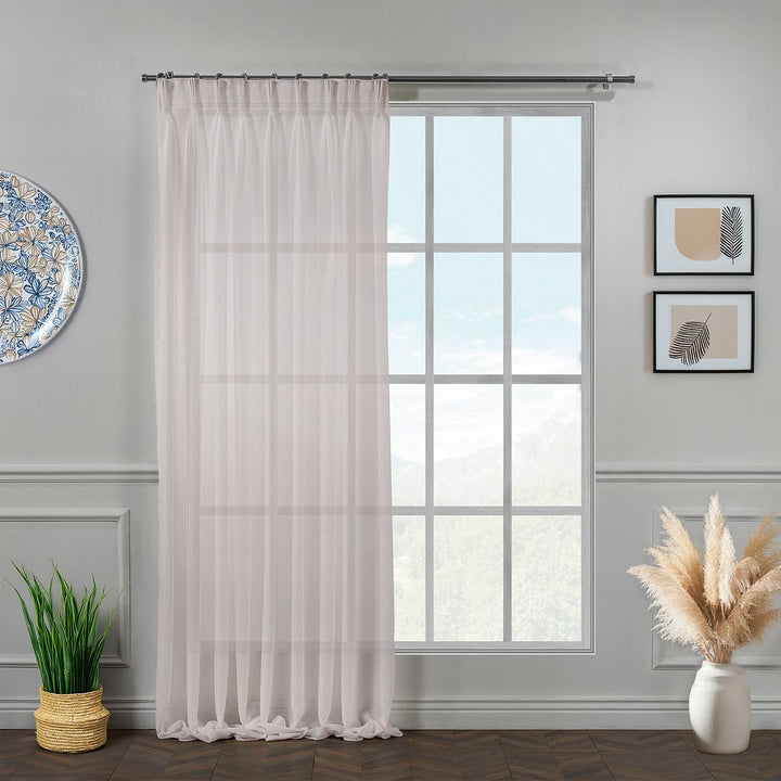 Made‑to‑measure extra‑long and extra‑wide pink pinch‑pleated chiffon semi‑sheer curtain with refined structured pleats and a soft pastel translucent drape.