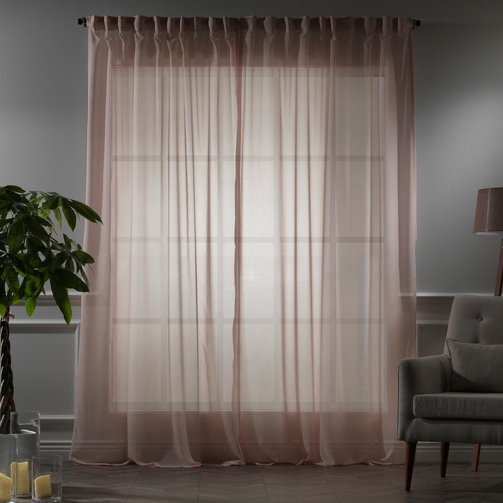 Made‑to‑measure extra‑long and extra‑wide Pink silk‑crepe sheer curtain in evening light, highlighting the fine crepe weave and gentle soft‑glow translucency.