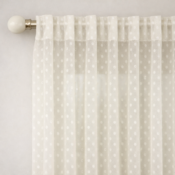 Made‑to‑measure extra‑long and extra‑wide dotted sheer curtain with soft translucent drape and delicate woven dot pattern.