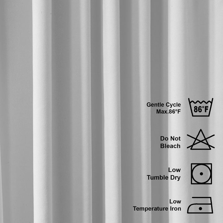Close‑up pure white velour fabric showing fine pile texture, matte surface and premium soft finish.