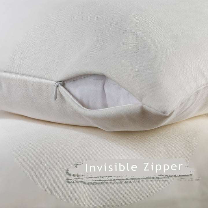 A made to measure cushion cover in pure white velour, displayed from the side with a smooth lightweight texture and neatly finished seams for a refined decorative style and details